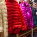 colorful down jackets displayed in a shop